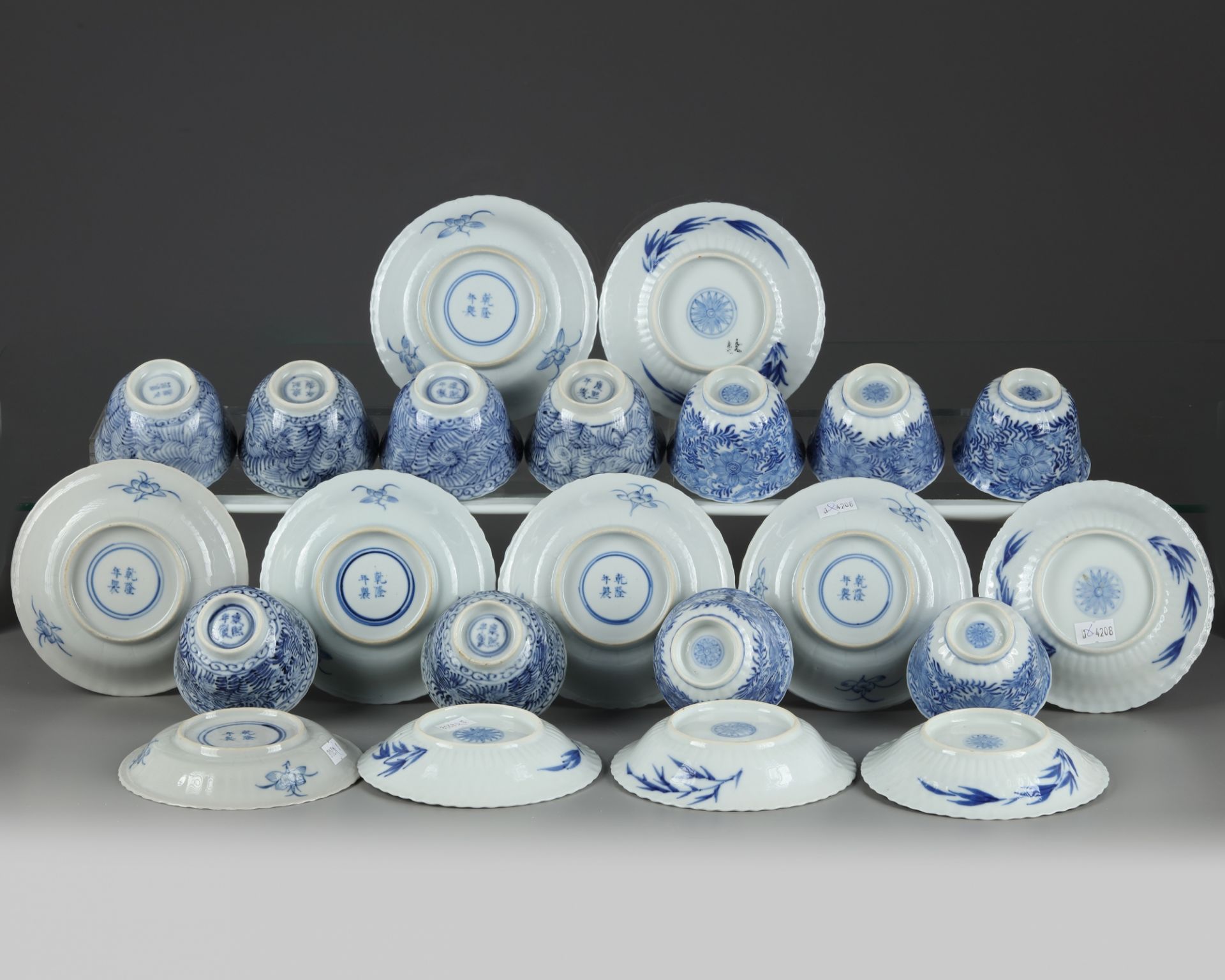 A set and a matched set of Chinese blue and white flower scroll cups and saucers - Image 4 of 4