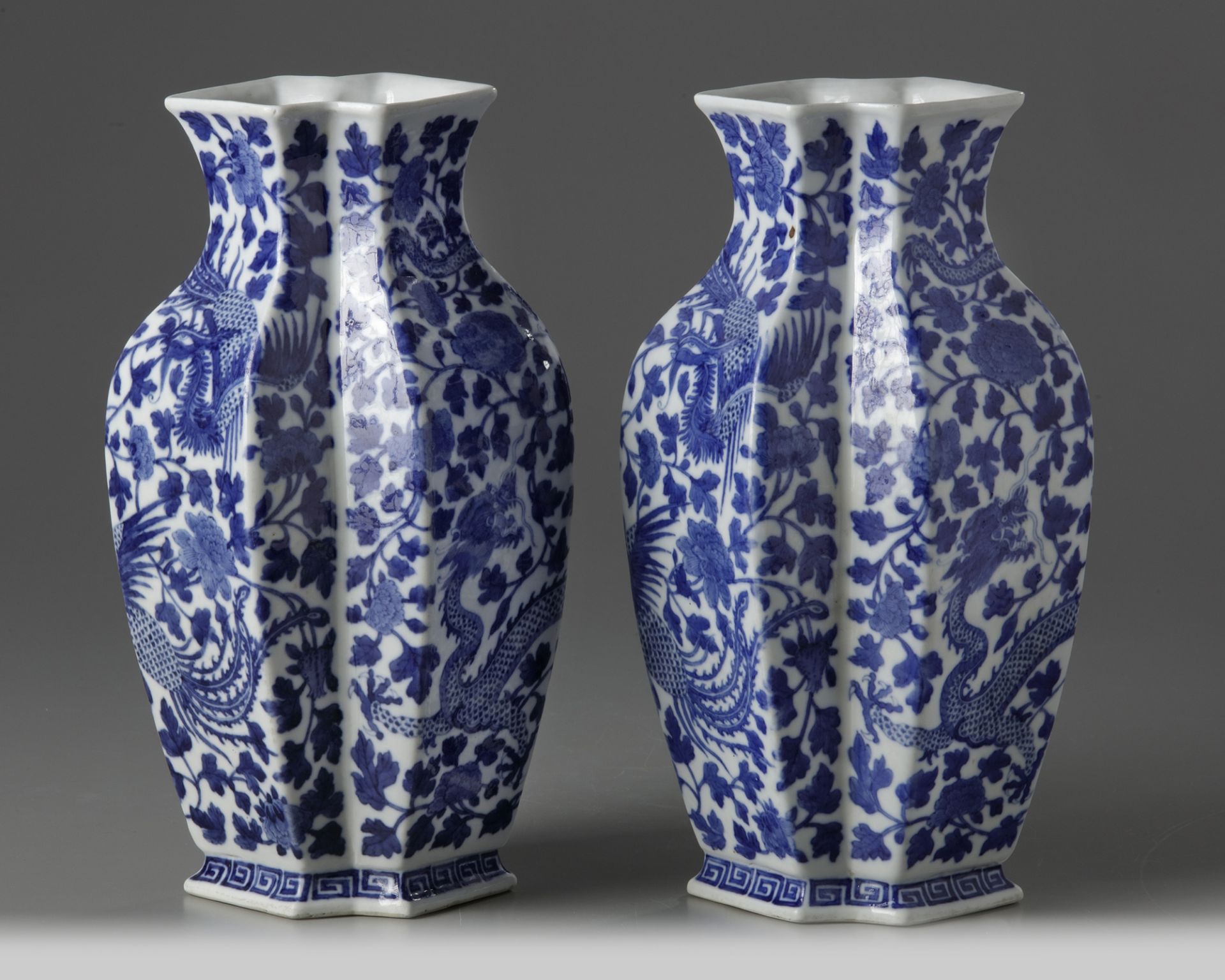 A pair of Chinese 'dragon and phoenix' double lozenge vases