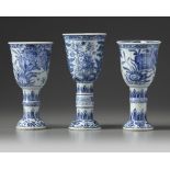 Three Chinese blue and white stemmed beakers