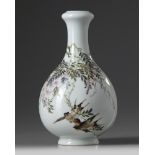 A Chinese famille rose 'bird and wisteria' vase