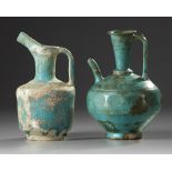 Two Islamic turquoise glazed jugs