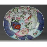 A large Chinese famille rose 'pseudo-tobacco leaf' oval platter