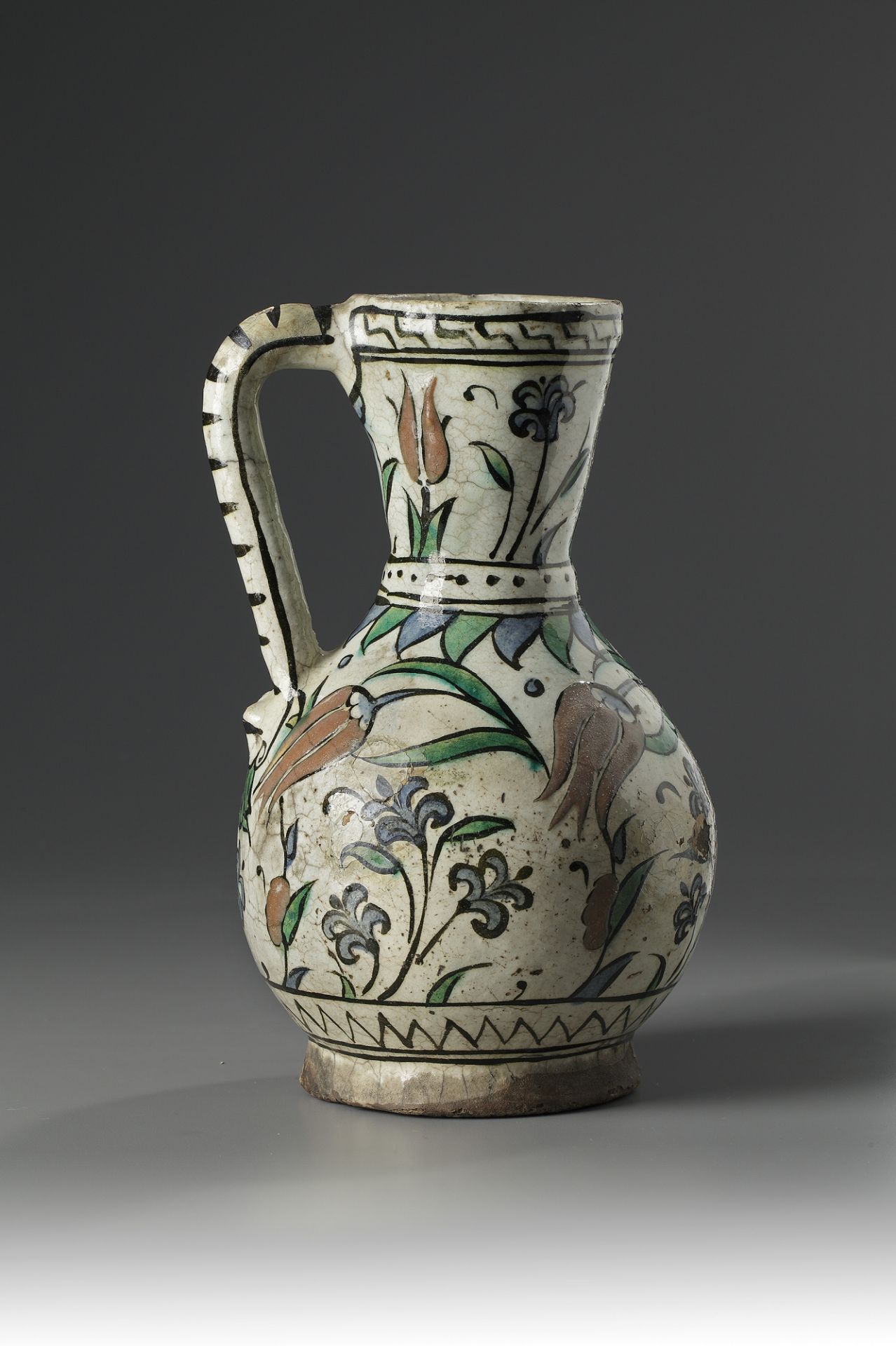 An Iznik pottery jug