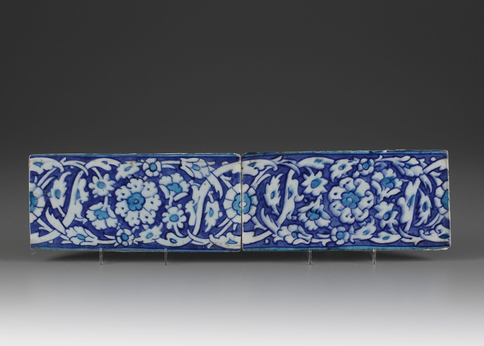 A pair of Iznik pottery tiles