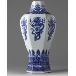 A Chinese blue and white hexagonal 'dragon' vase