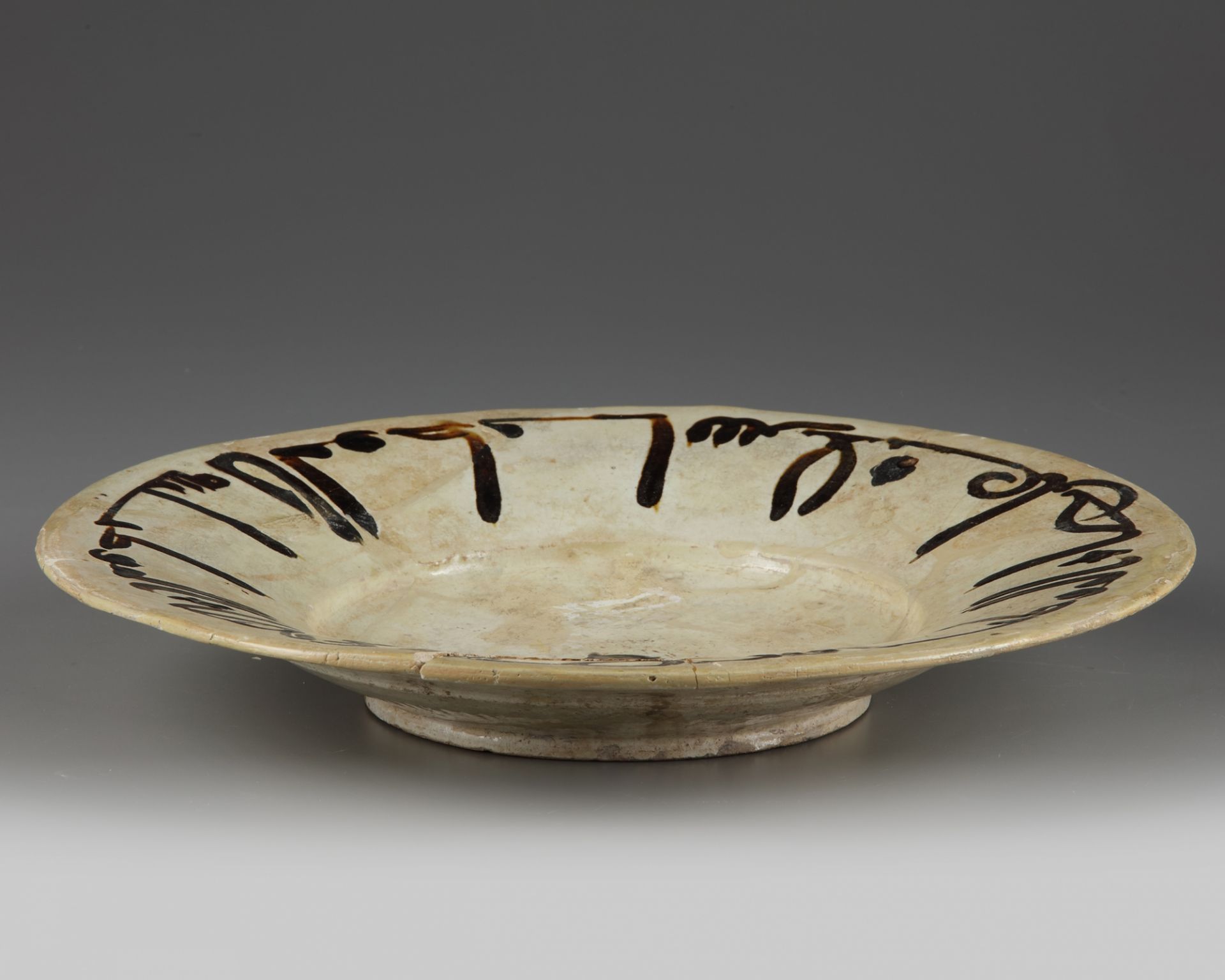 A slip-painted calligraphic pottery dish - Image 3 of 3