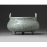 A Chinese grey crackle-glazed tripod censer