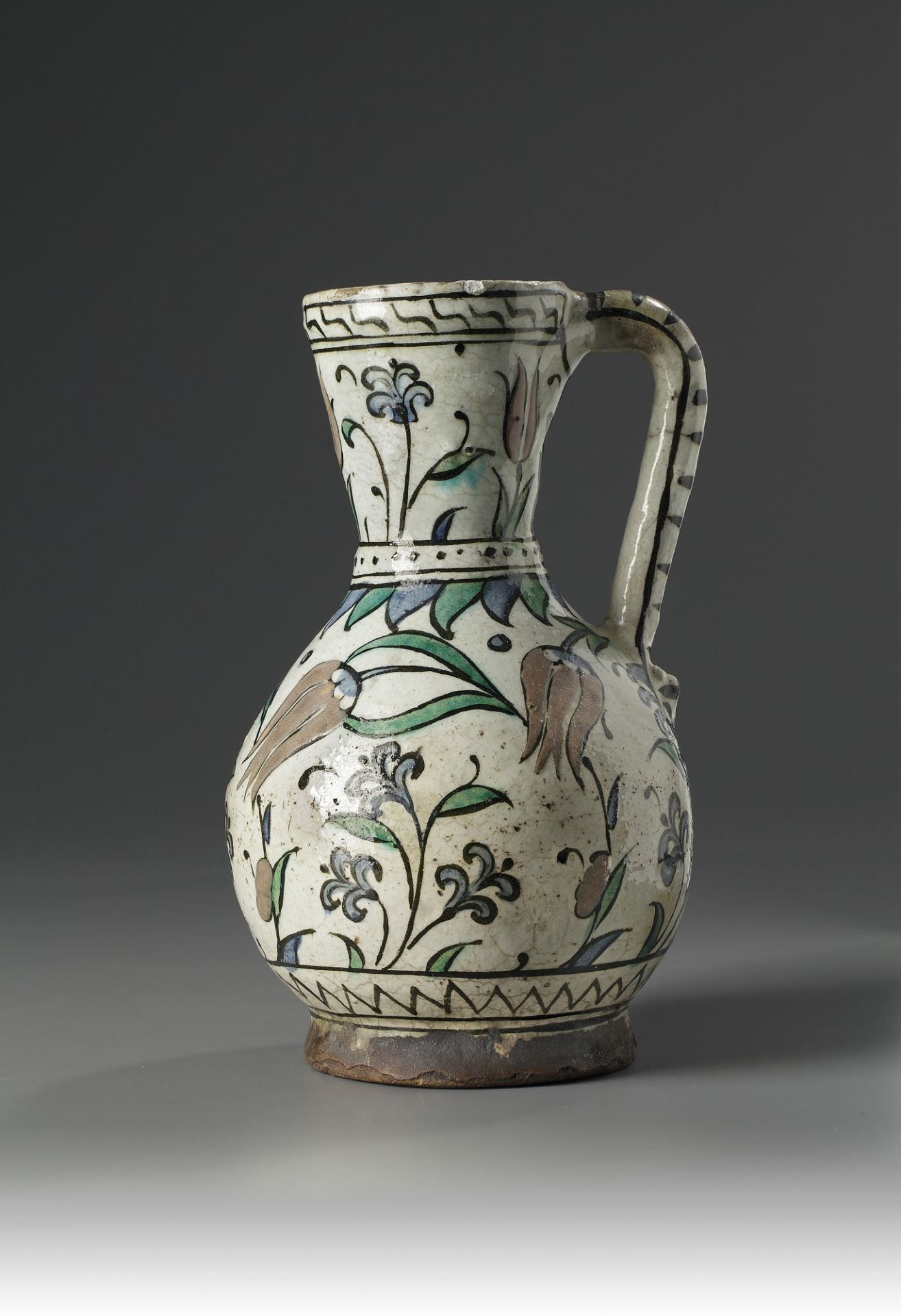 An Iznik pottery jug - Image 4 of 4