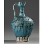 An Islamic pottery ewer