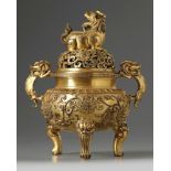 A Chinese gilt bronze tripod censer and cover