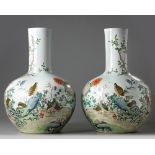 A pair of large Chinese famille rose 'quails' bottle vases, tianqiuping