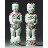 Two Chinese famille rose figures of boys