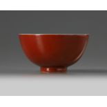 A Chinese coral red-enamelled blue and white bowl
