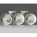 Two pairs of Chinese famille rose cups and saucers and a famille rose spoon tray