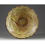 A large Nishapur 'imitation lustre' pottery bowl