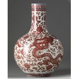 A Chinese underglaze copper-red-decorated 'dragon' vase