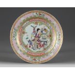 A Chinese ruby-back famille rose 'lady and boys' dish