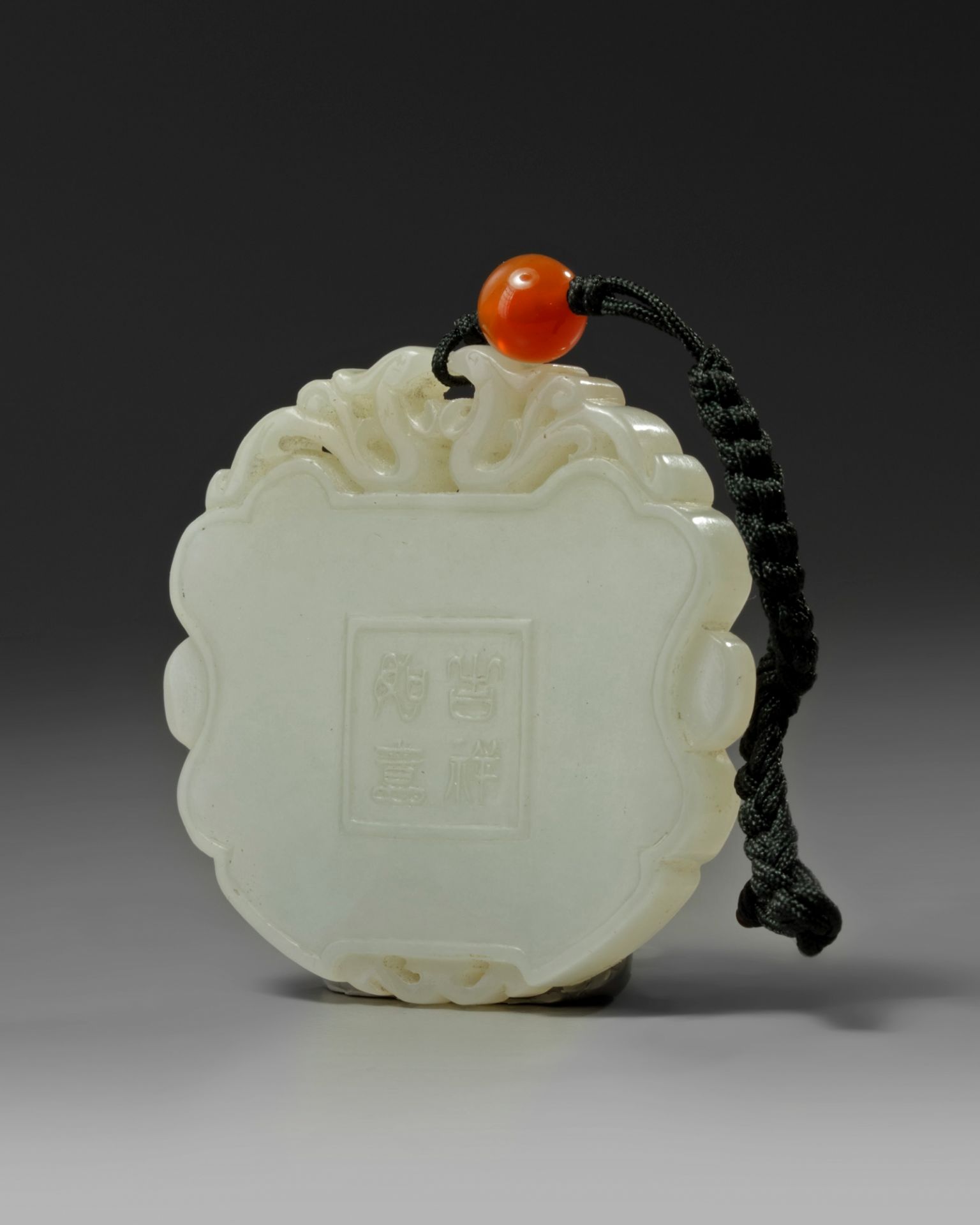A Chinese white jade plaque