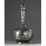 A large silver-inlaid Bidri vase with a cover