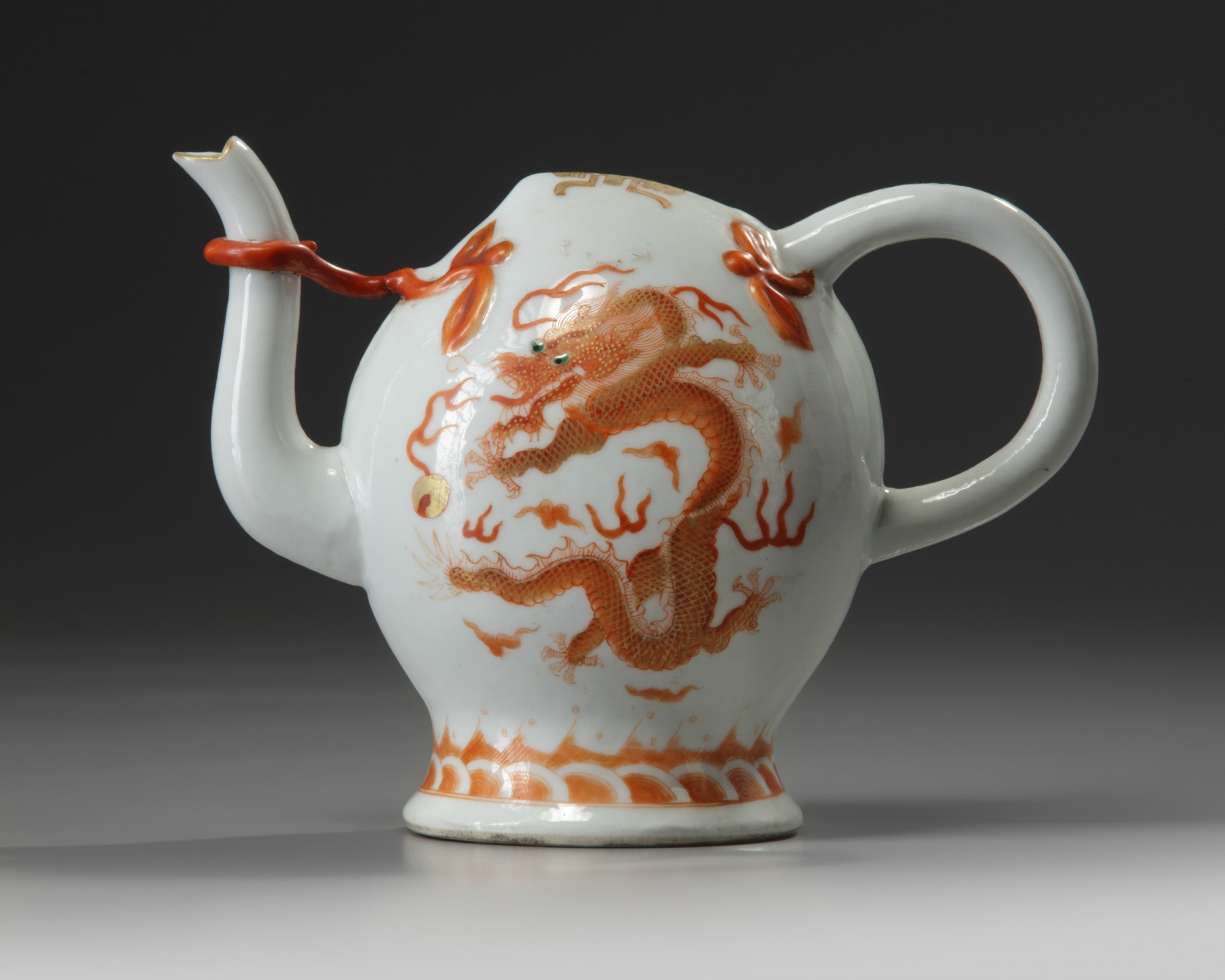 A Chinese iron-red-decorated 'dragon' Cadogan teapot