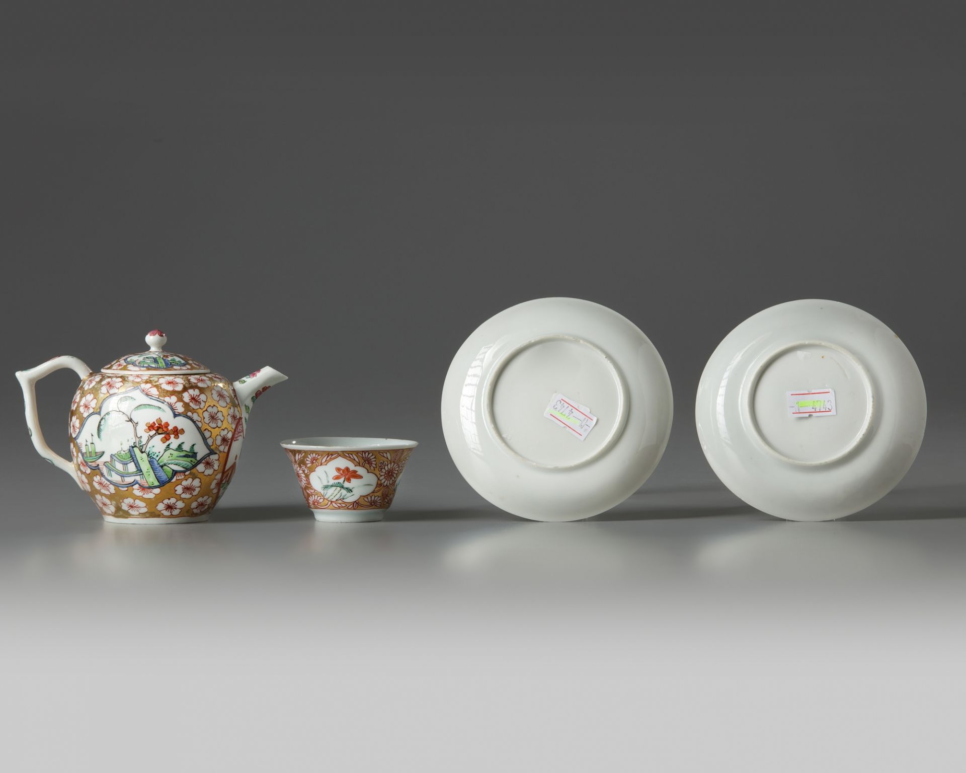 A Chinese gilt and famille rose-decorated cups and saucers and a Meissen 'Chinoiserie' teapot - Image 2 of 4