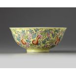 A Chinese yellow-ground famille rose 'gourds' bowl