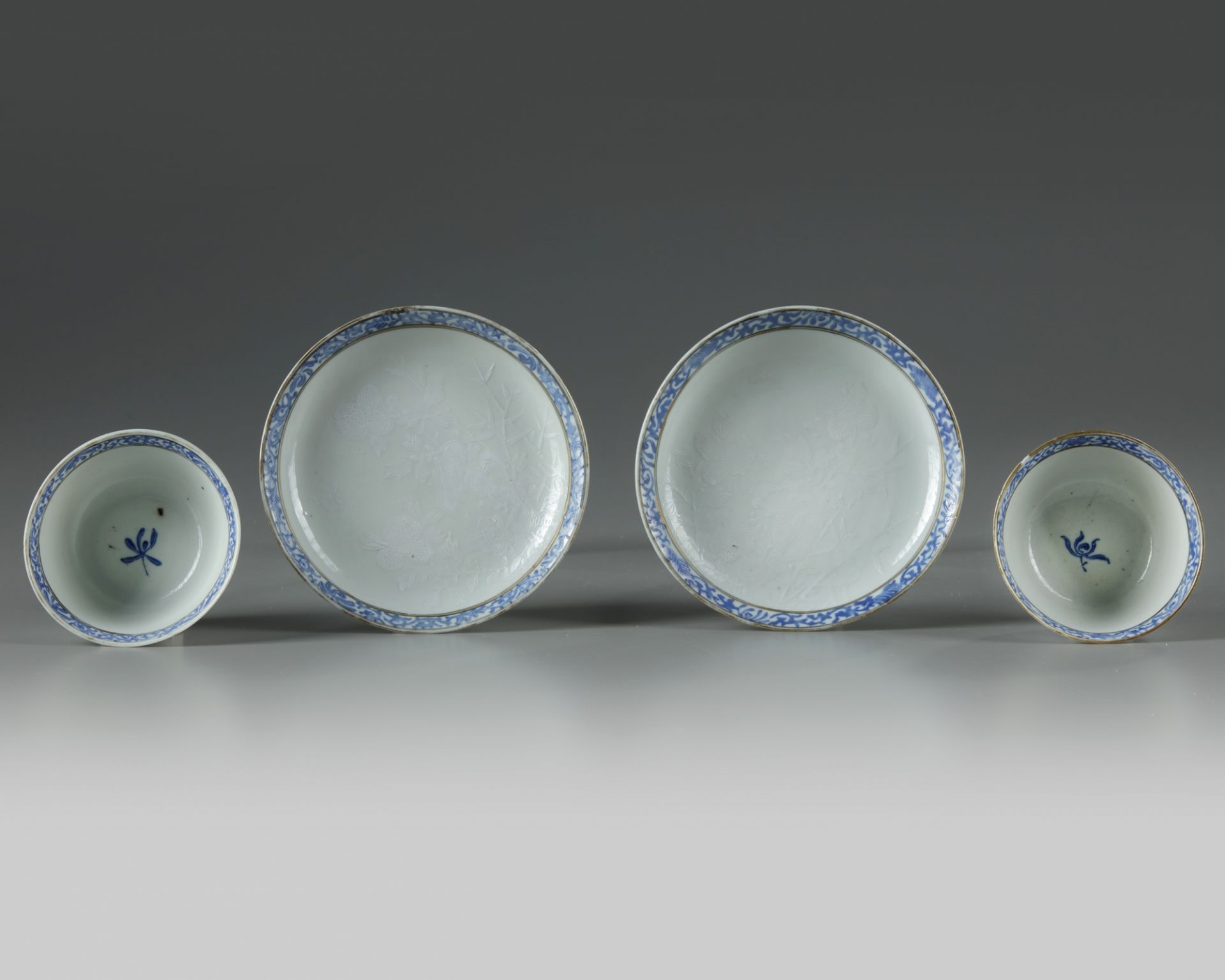 A pair of Chinese bianco sopra bianco-decorated cups and saucers - Image 3 of 4