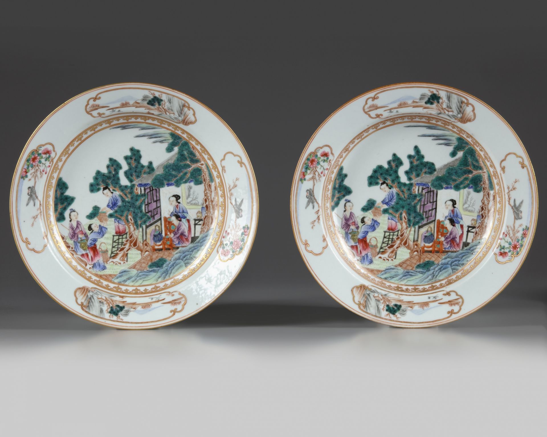 A pair of Chinese famille rose 'ladies' soup plates