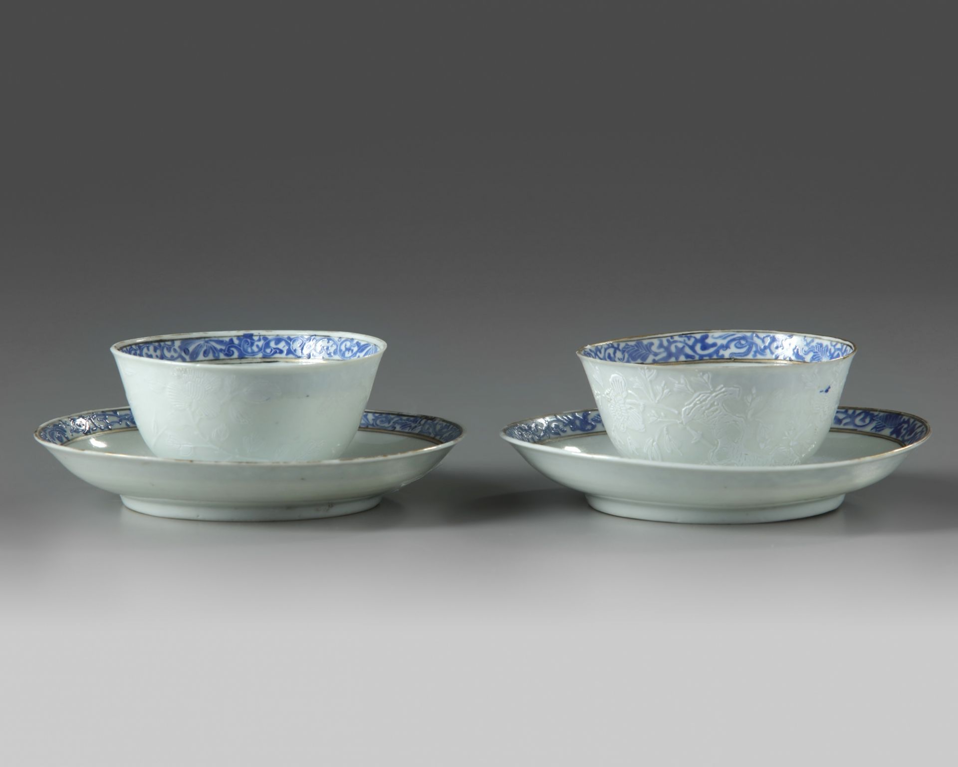 A pair of Chinese bianco sopra bianco-decorated cups and saucers - Image 2 of 4