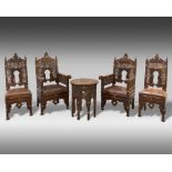 Four Syrian mother of pearl inlaid wooden chairs and a table