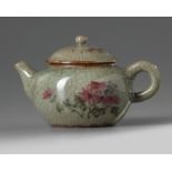 A Chinese crackle-glazed famille rose teapot and cover