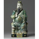 A Chinese famille verte biscuit figure of Guandi