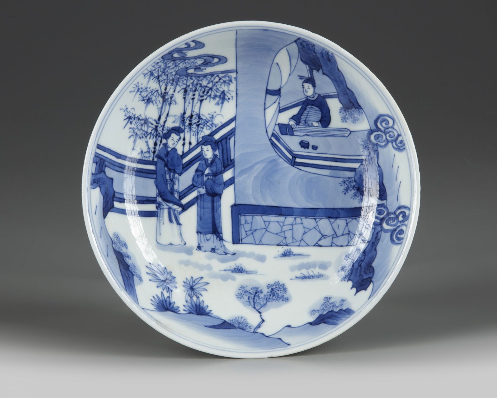 A Chinese blue and white 'Romance of the Western Chamber' dish