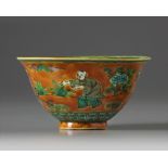 A Chinese amber-ground turquoise, aubergine, and green-glazed bowl
