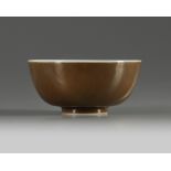 A Chinese brown-glazed bowl