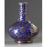 A Chinese blue-ground gilt-decorated 'dragon and phoenix' bottle vase