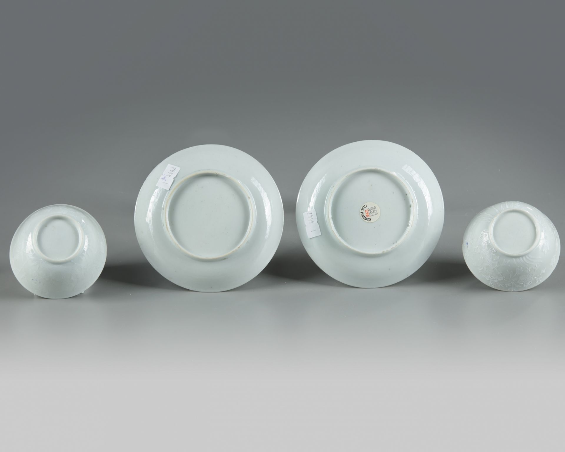 A pair of Chinese bianco sopra bianco-decorated cups and saucers - Image 4 of 4