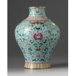 A Chinese turquoise-ground famille rose vase