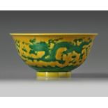 A Chinese yellow-ground green-enamelled 'dragon' bowl