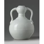 A Chinese white-glazed double gourd vase
