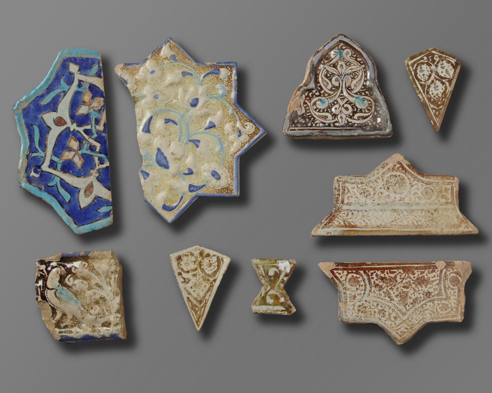 A group of nine Islamic pottery tiles