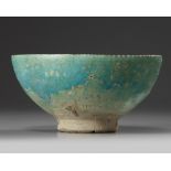 An Islamic turquoise glazed bowl