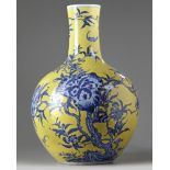 A Chinese yellow-ground blue and white 'nine peach' vase, tianqiuping