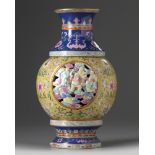 A Chinese famille rose 'Eighteen Luohan' revolving vase