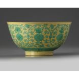A Chinese yellow-ground green-enamelled 'Eight Buddhist Emblems' bowl