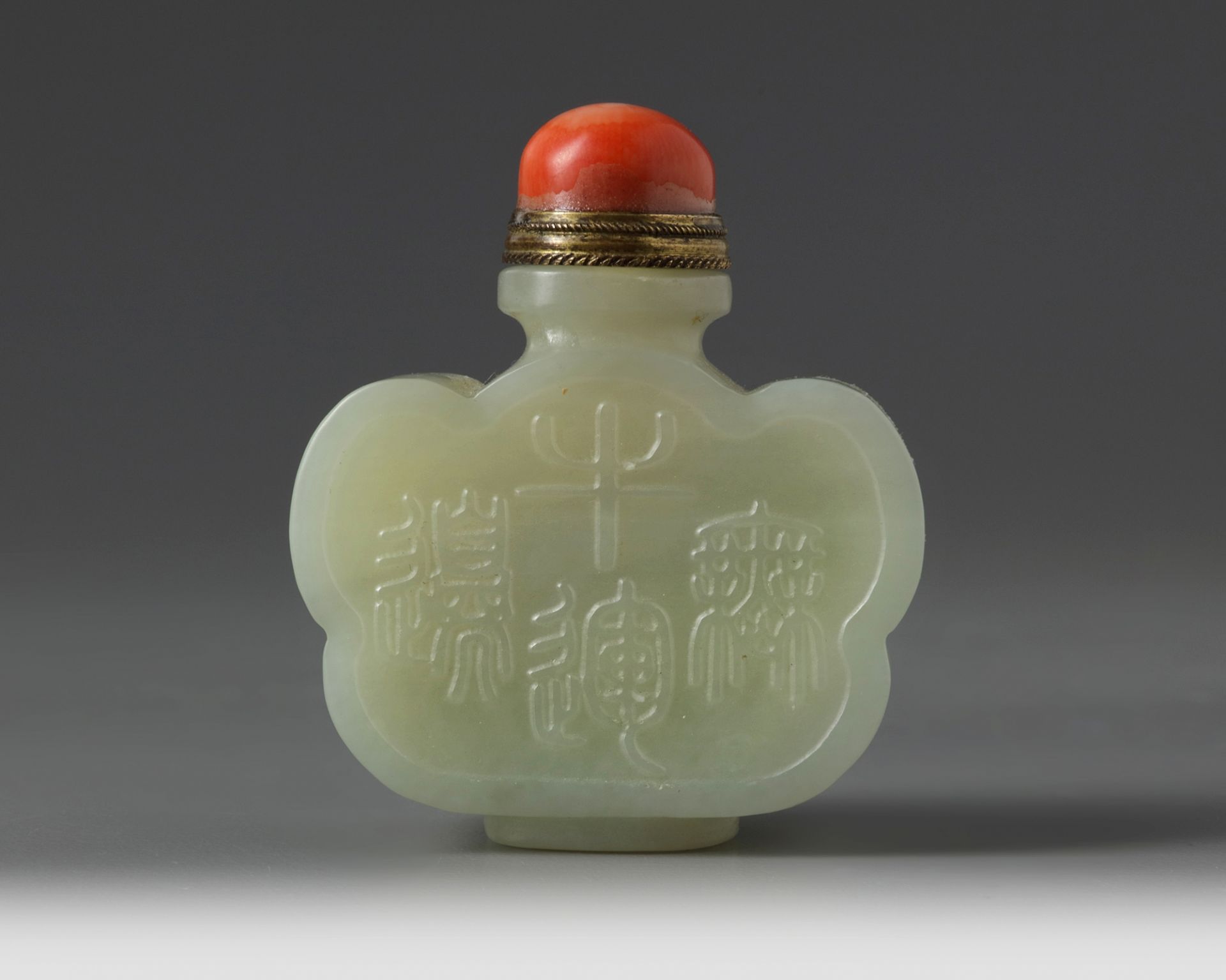 A Chinese pale celadon jade snuff bottle