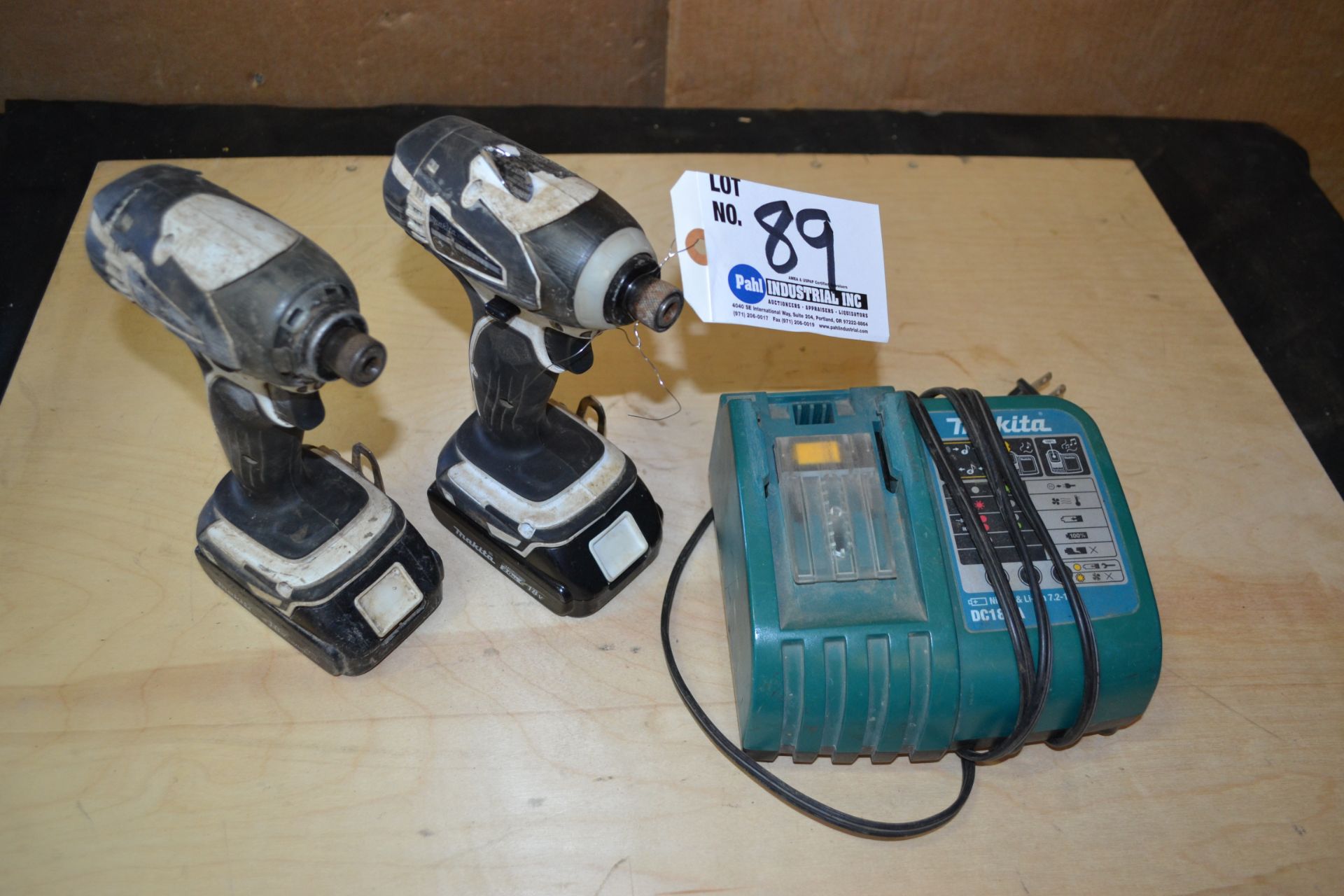 2 Makita XDT04 Cordless Impact Drivers c/w 2 Batteries, Charger