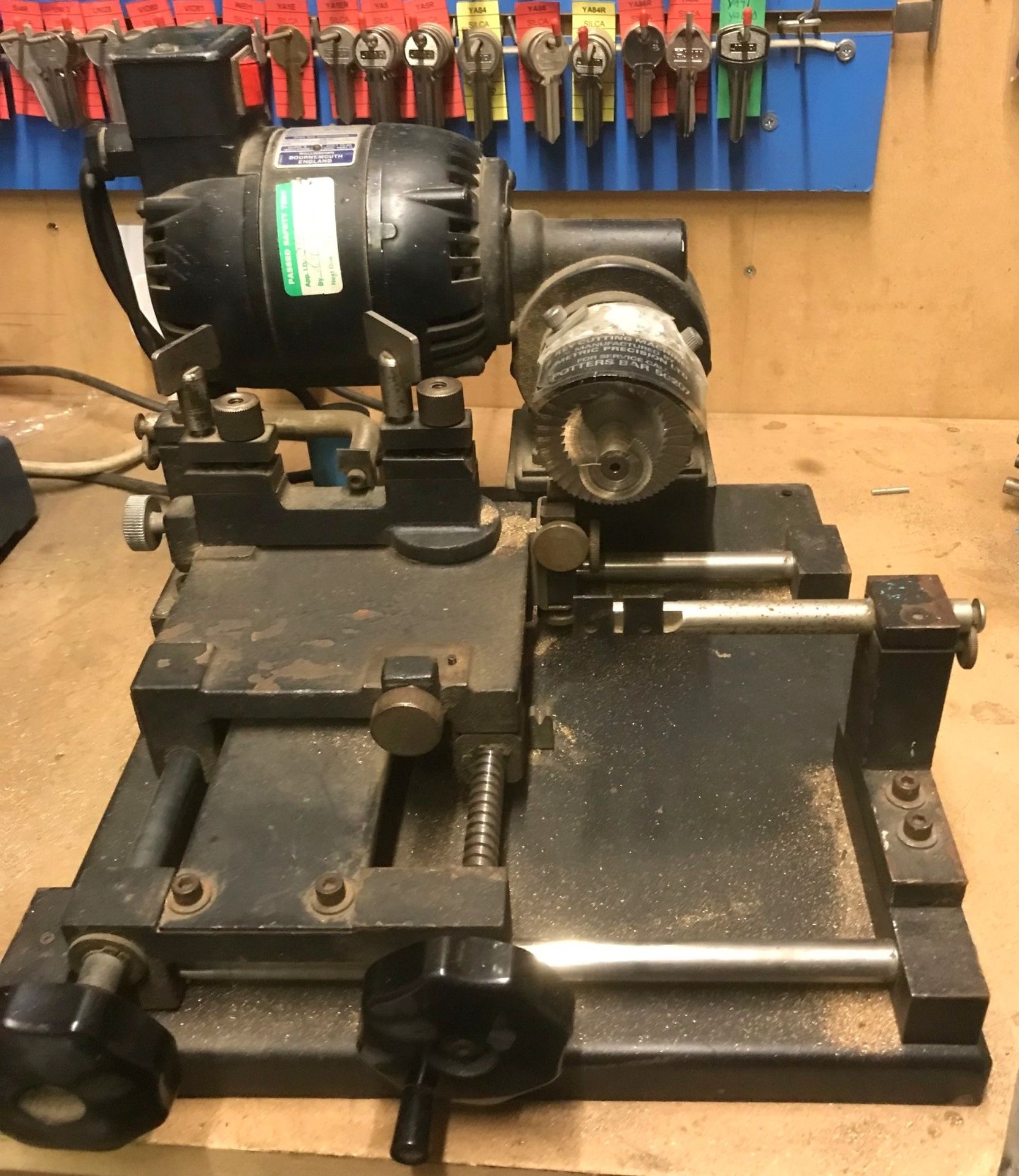 2 Key Cutting Machines & Ryobi EBG2515 Bench Grinder (located at Tooting, viewing Tuesday 23rd,