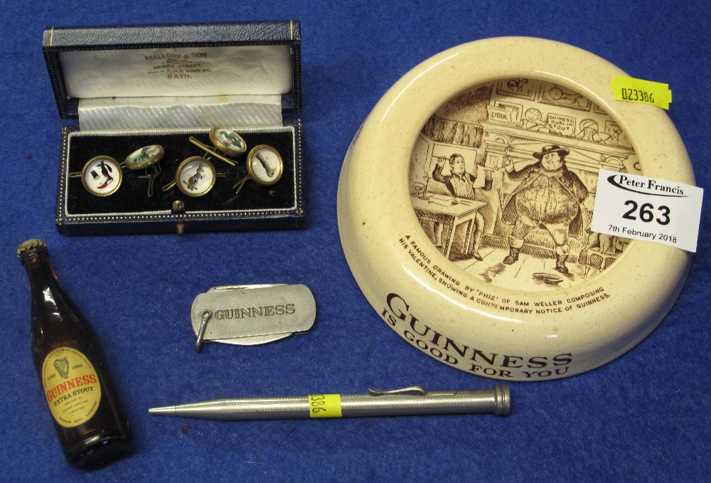 Collection of assorted Guinness items to include: set of five Guinness buttons in associated box;