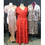 Five vintage dresses to include: a 50's blue ground silky fabric paisley pattern mid-length dress